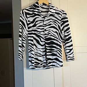Guess black and white top, size is XL but more like a S or M